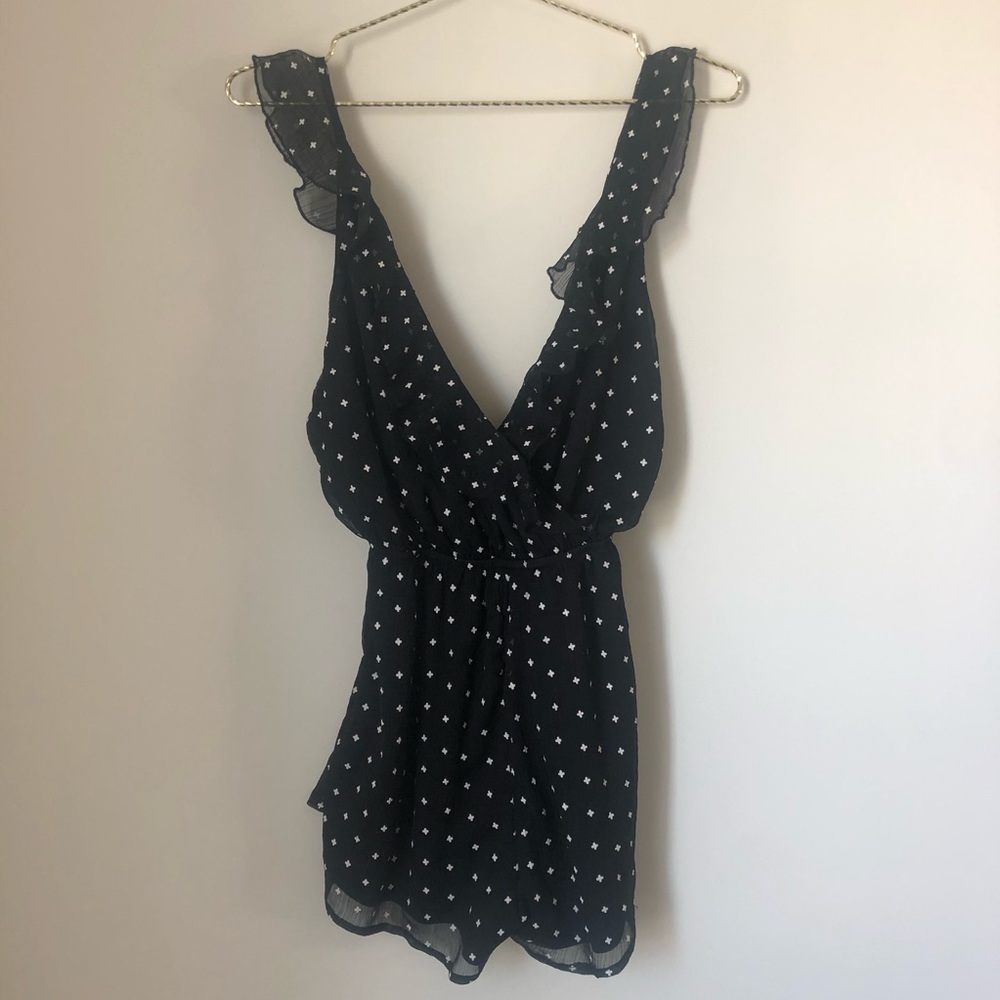 Revolve by the way. Aurora Ruffle Romper in Black - Picture 3 of 7